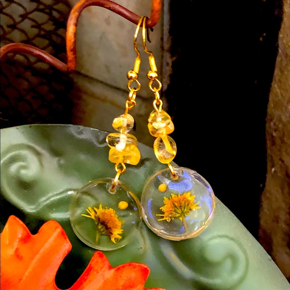 Resin mustard seed and flower earrings. New.